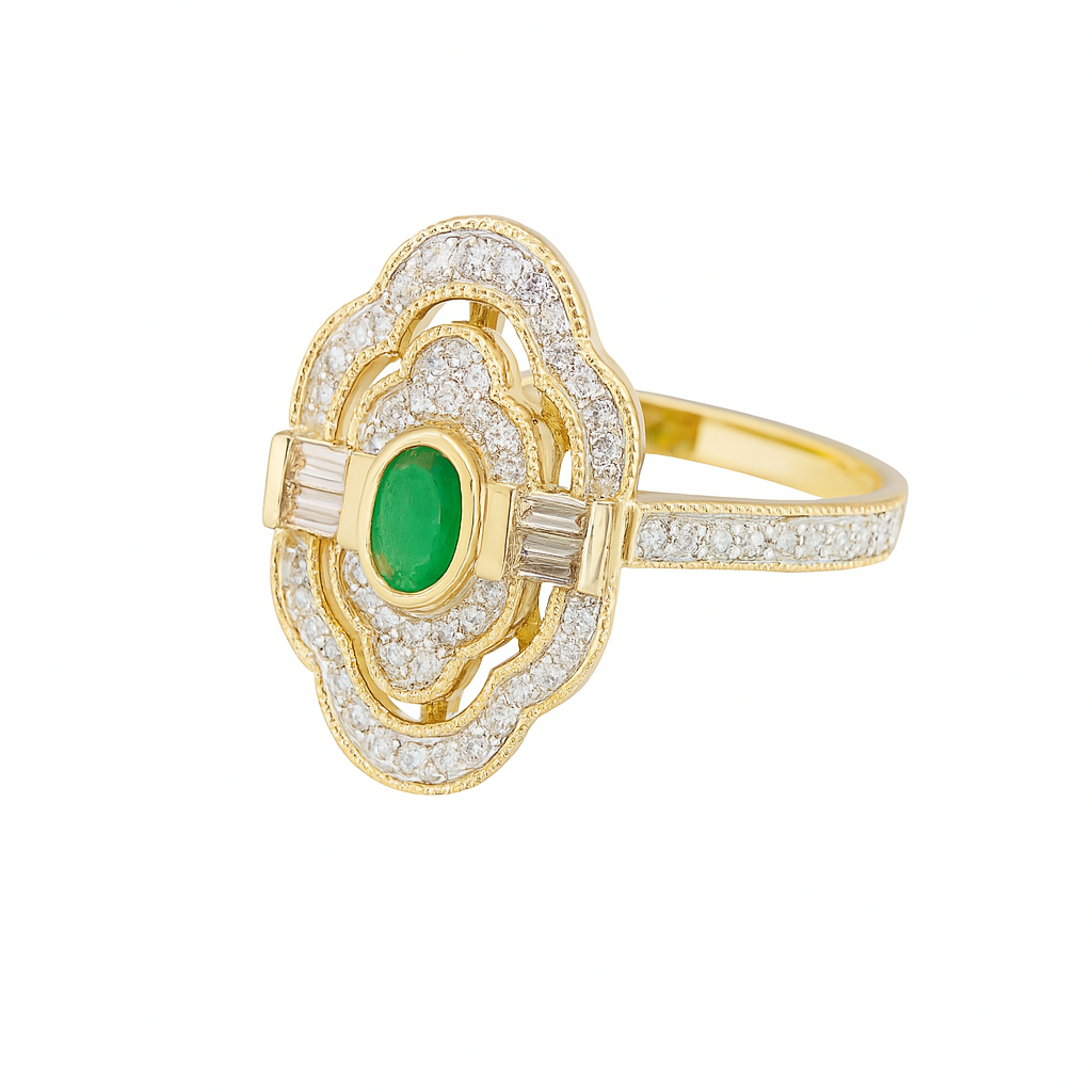 Gold ring with a green gemstone on a white background