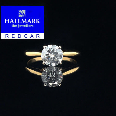 Gold ring with a diamond Qualified Gemmologist