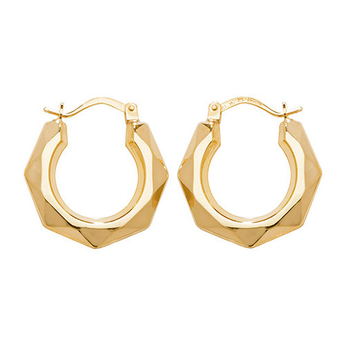 Gold hoop earrings on a white background