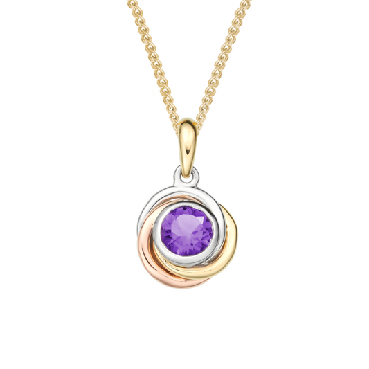 Gold necklace with a purple gemstone pendant qualified gemmologist