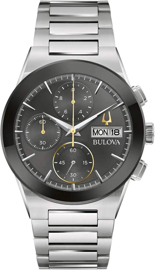 Bulova watch with silver bracelet and black dial on a white background